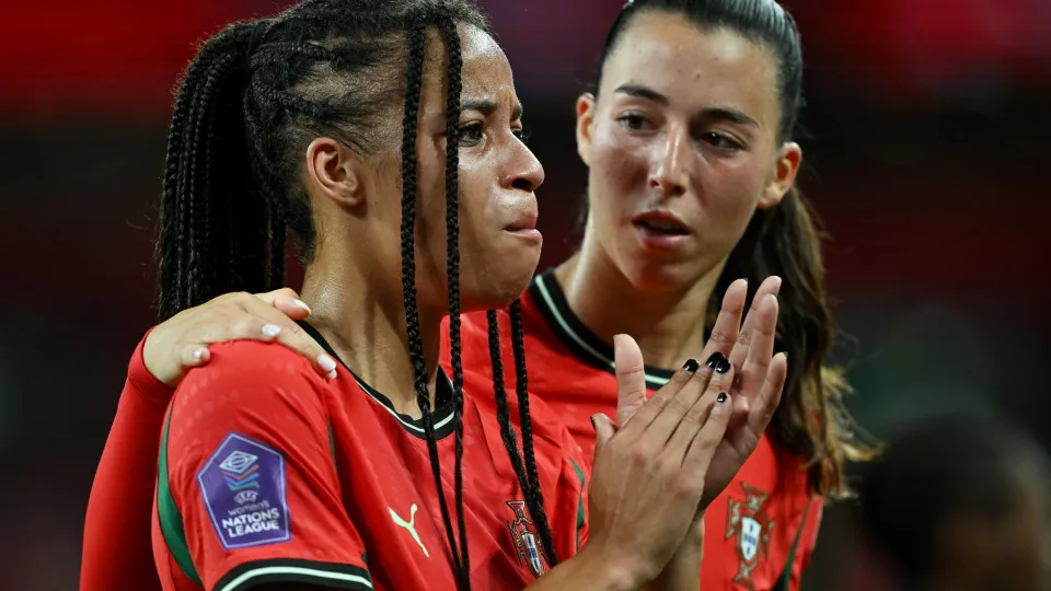 LONDON, ENGLAND - MAY 30: Jessica Silva of Portugal is consoled by team mate Carolina Correia of Portugal following the UEFA Women's Nations League 2024/25 Grp A3 MD5 match between England and Portugal at Wembley Stadium on May 30, 2025 in London, England