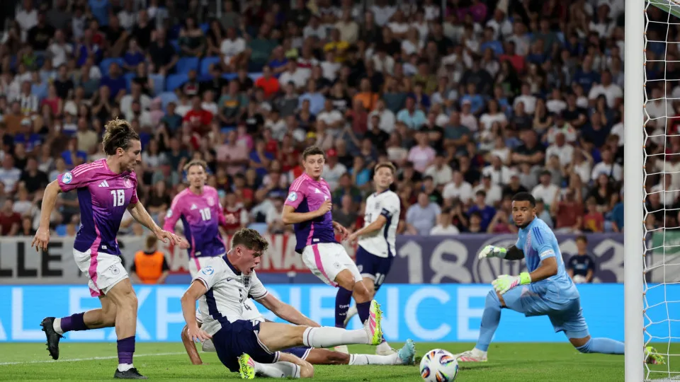 BRATISLAVA, SLOVAKIA - JUNE 28: Charlie Cresswell of England misses a chance as Noah Atubolu of Germany looks on during the UEFA European Under-21 Championship 2025 Final match between England and Germany at National Football stadium on June 28, 2025 in B