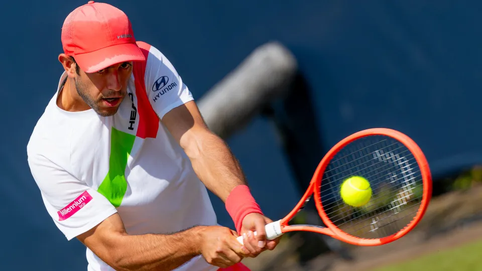 ROSMALEN, NETHERLANDS - JUNE 13: Nuno Borges of Portugal in action during Day Five of 2025 Libema Open Grass Court Championships at Autotron on June 13, 2025 in Rosmalen, Netherlands. (Photo by Joris Verwijst/BSR Agency/Getty Images)