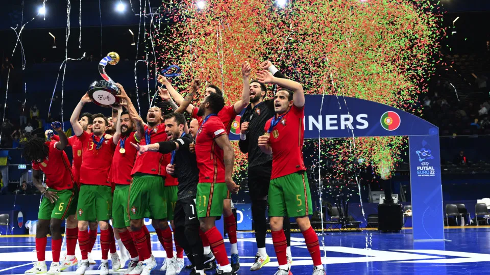 AMSTERDAM, NETHERLANDS - FEBRUARY 06: Players of Portugal celebrate with the Trophy after the UEFA Futsal Euro 2022 Final match between Portugal and Russia at Ziggo Dome on February 06, 2022 in Amsterdam, Netherlands. (Photo by Oliver Hardt - UEFA/UEFA vi