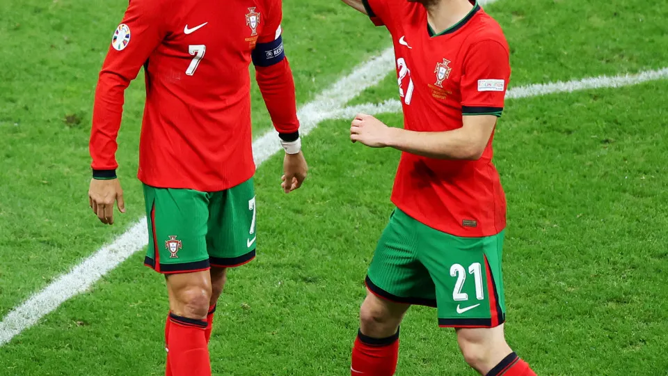 FRANKFURT AM MAIN, GERMANY - JULY 01: Cristiano Ronaldo of Portugal is consoled by Diogo Jota at the end of the first half of extra time during the UEFA EURO 2024 round of 16 match between Portugal and Slovenia at Frankfurt Arena on July 01, 2024 in Frank