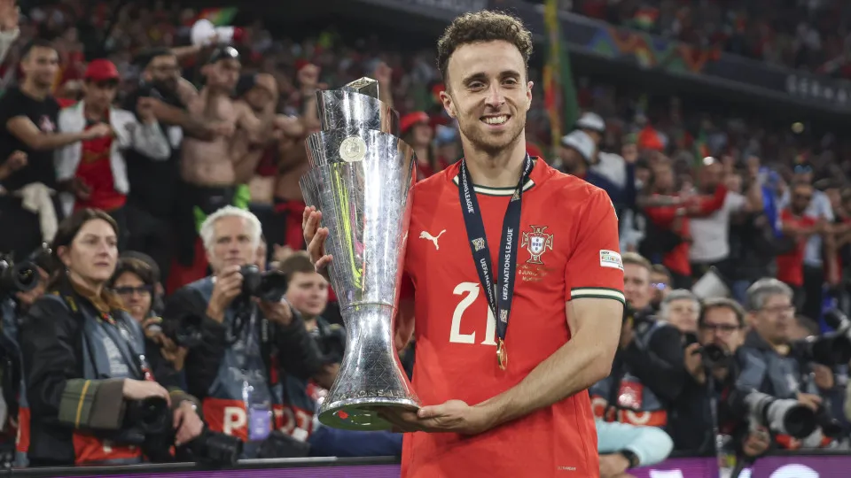 MUNICH, GERMANY - JUNE 08: Diogo Jota of Portugal poses for a photograph with the UEFA Nations League trophy after his team's victory in the UEFA Nations League 2025 final match between Portugal and Spain at Munich Football Arena on June 08, 2025 in Munic