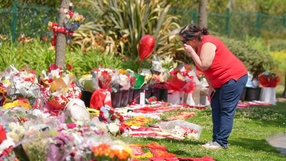 People lay flowers in memory of Diogo Jota at Anfield in Liverpool, England, on July 3, 2025. (Photo by Giannis Alexopoulos/NurPhoto via Getty Images)
