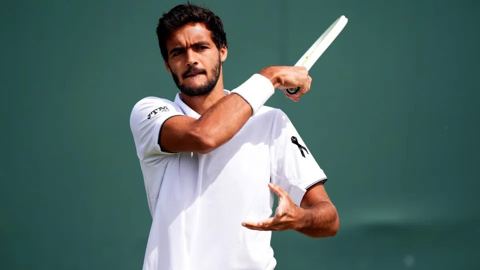 Francisco Cabral of Portugal, wearing a black ribbon in memory of compatriot Diogo Jota who died at the age of 28, on day five of the 2025 Wimbledon Championships at the All England Lawn Tennis and Croquet Club, London. Jota and his brother Andre Silva we