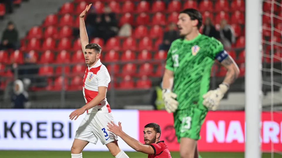 TBILISI, GEORGIA - NOVEMBER 15: Dominik Prpic of Croatia and Gizo Mamageishvili of Georgia react during the UEFA Under-21 Championship Play-Off First Leg match between Georgia and Croatia at Mikheil Meskhi Stadium on November 15, 2024 in Tbilisi, Georgia.