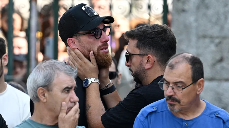 GONDOMAR, PORTUGAL - JULY 05: Jose Sa, Football player for Wolverhampton Wanders and the Portugal national team, is consoled after funeral held for Diogo Jota and his brother Andre Silva at Igreja Matriz de Gondomar on July 05, 2025 in Gondomar, Portugal.