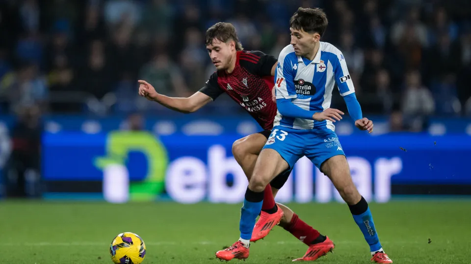 LA CORUNA, SPAIN - DECEMBER 22: Rafael Obrador of RC Deportivo de La Coruña competes for the ball with Hugo Rincón of CD Mirandés during the Liga Hypermotion match between RC Deportivo de La Coruña and CD Mirandés at Abanca Riazor Stadium on December 22, 