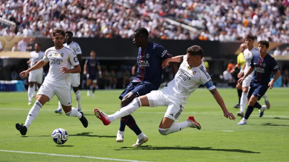 EAST RUTHERFORD, NEW JERSEY - JULY 09: Nuno Mendes #25 of Paris Saint-Germain attempts a shot on goal during the FIFA Club World Cup 2025 semi-final match between Paris Saint-Germain and Real Madrid CF at MetLife Stadium on July 09, 2025 in East Rutherfor