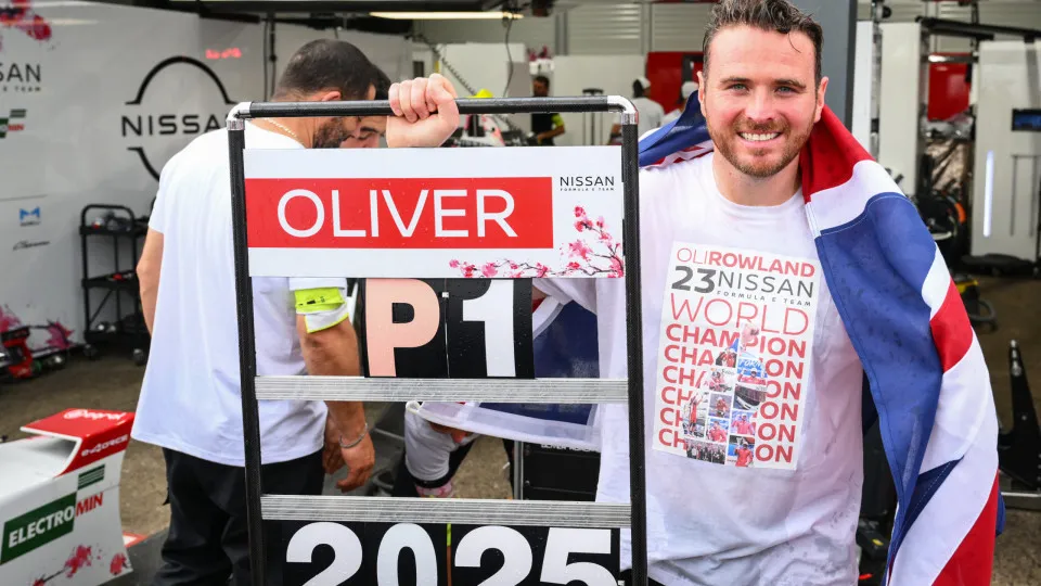 BERLIN, GERMANY - JULY 13: World Driver’s Champion Oliver Rowland of Great Britain and Nissan Formula E Team celebrates in the Pitlane during the Berlin E-Prix, Round 14 of the 2025 FIA Formula E World Championship at Tempelhof Airport Circuit on July 13,