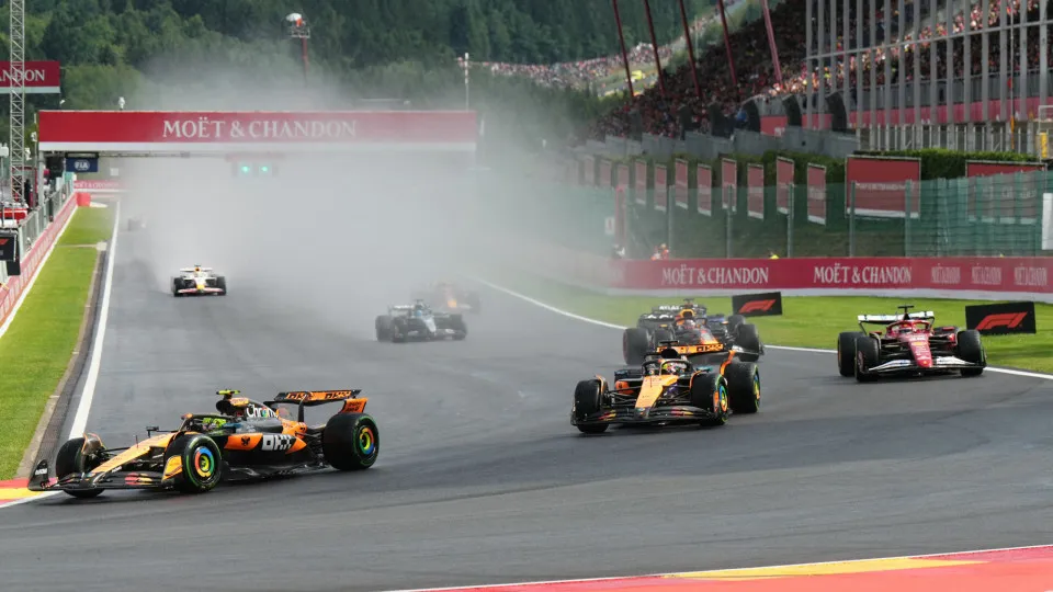 McLaren's British driver Lando Norris drives ahead of McLaren's Australian driver Oscar Piastri races during the Formula One Belgian Grand Prix at the Spa-Francorchamps circuit in Spa, on July 27, 2025. (Photo by Dimitar DILKOFF / AFP) (Photo by DIMITAR D