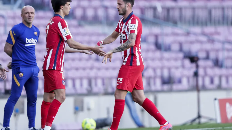 BARCELONA, SPAIN - MAY 8: (L-R) Joao Felix of Atletico Madrid, Saul Niguez of Atletico Madrid during the La Liga Santander  match between FC Barcelona v Atletico Madrid at the Camp Nou on May 8, 2021 in Barcelona Spain (Photo by David S. Bustamante/Soccra