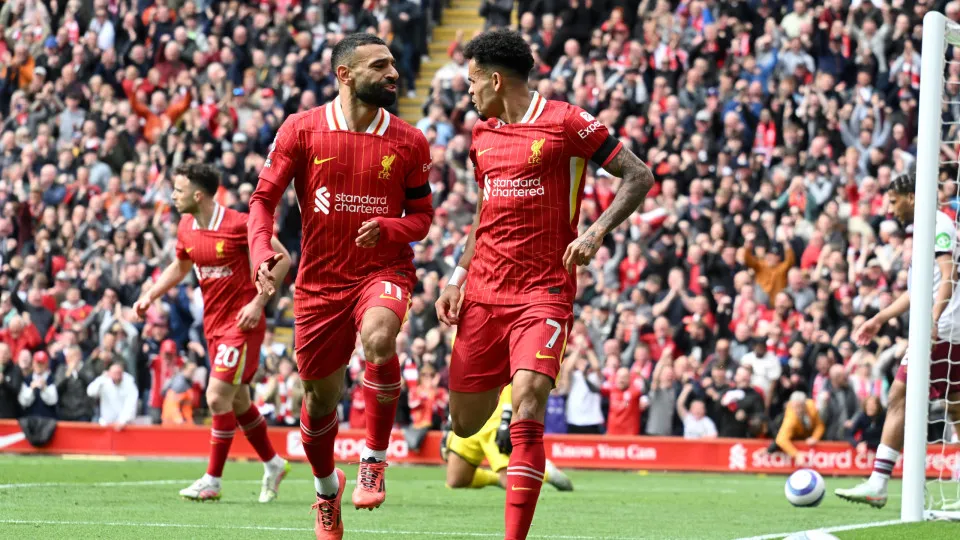 LIVERPOOL, ENGLAND - APRIL 13: (SUN OUT, SUN ON SUNDAY OUT) Luis Diaz of Liverpool celebrates scoring his team's first goal with teammate Mohamed Salah during the Premier League match between Liverpool FC and West Ham United FC at Anfield on April 13, 202
