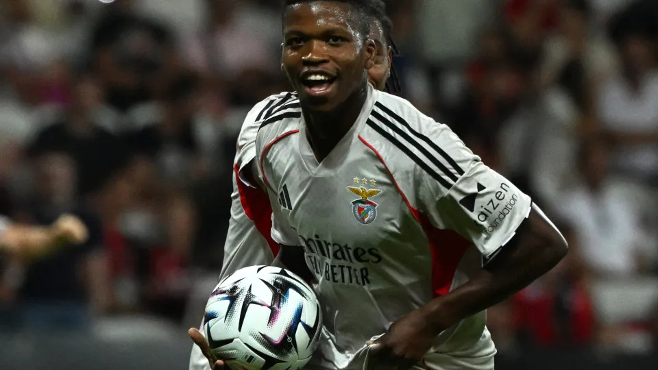 Benfica's Portuguese midfielder #61 Florentino (R) celebrates scoring his team's second goal during the UEFA Champions League 3rd round first leg football match between OGC Nice and SL Benfica at the Allianz Riviera Stadium in Nice, south-eastern, on Augu