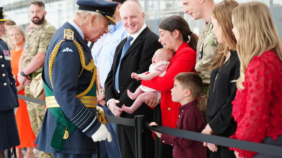 LOSSIEMOUTH, SCOTLAND - AUGUST 6: King Charles III meets RAF soldiers and their families, during a visit to RAF Lossiemouth in Moray to re-present a Squadron Standard on August 6, 2025 in Lossiemouth, Scotland. (Photo by Jane Barlow - WPA Pool/Getty Image