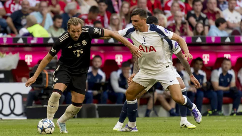 Munich, Germany - August 7: Harry Kane of Bayern Muenchen and Joao Palhinha of Tottenham Hotspur battle for the ball during the Pre-Season Friendly match between FC Bayern München and Tottenham Hotspur at Allianz Arena on August 7, 2025 in Munich, Germany