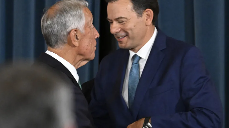 LISBON, PORTUGAL - JUNE 05: Portuguese President Marcelo Rebelo de Sousa congratulates Prime Minister Luis Montenegro at the end of the ceremony at the inauguration of the XXV Constitutional Government in a ceremony held at Palacio Nacional de Ajuda on Ju
