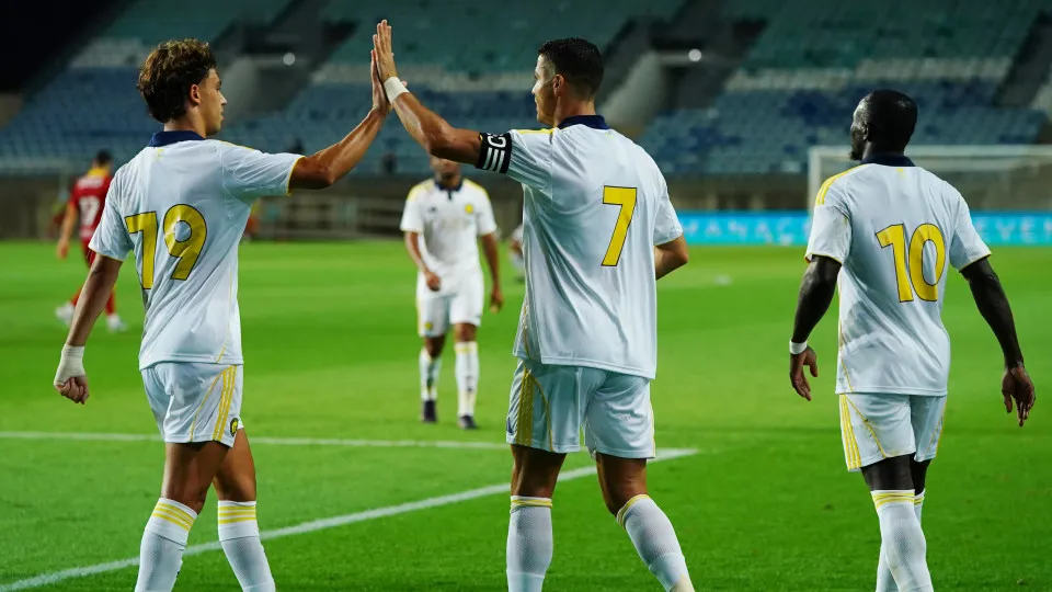 FARO, PORTUGAL - AUGUST 7: Cristiano Ronaldo of Al Nassr FC celebrates with teammate Joao Felix of Al Nassr FC after scoring a goal during the Pre-Season Friendly match between Al Nassr FC and Rio Ave FC at Estadio Algarve on August 7, 2025 in Faro, Portu
