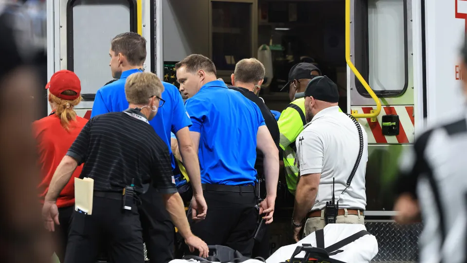 ATLANTA, GA - AUGUST 08: Medics and trainers load  Morice Norris #26 of the Detroit Lions onto an ambulance after he was injured during play during the Friday evening NFL preseason football game between the Atlanta Falcons and the Detroit Lions on August 