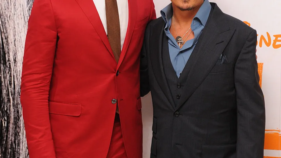 Armie Hammer (left) and Johnny Depp (right) arriving at the UK Premiere of The Lone Ranger, at the Odeon West End cinema in London.   (Photo by Dominic Lipinski/PA Images via Getty Images)