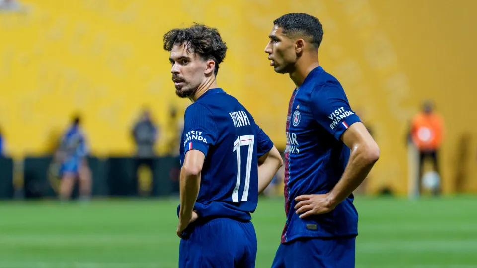 ATLANTA, GEORGIA - JUNE 29: Vitinha #17 of Paris Saint-Germain stands with Achraf Hakimi #2 of Paris Saint-Germain during a free kick during the FIFA Club World Cup 2025 round of 16 match between Paris Saint-Germain and Inter Miami CF at Mercedes-Benz Sta