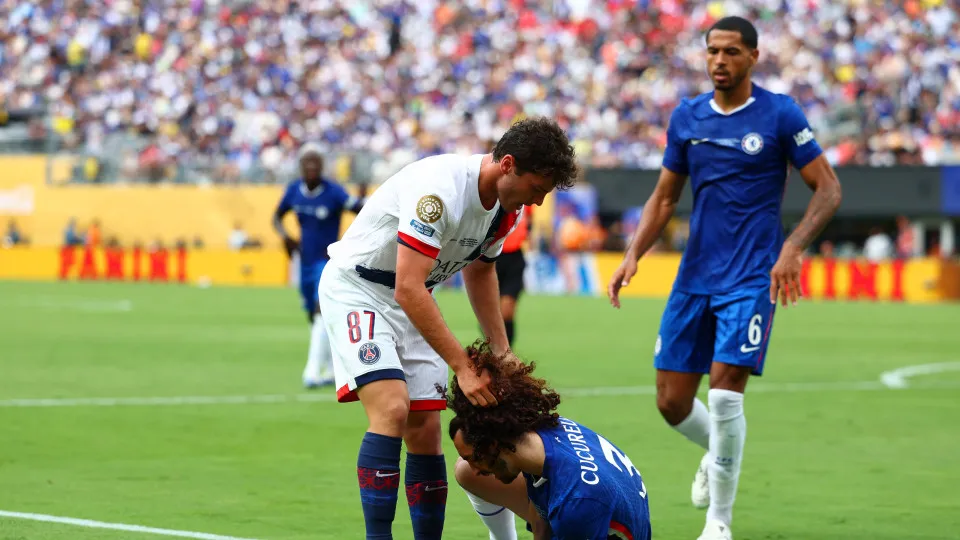 EAST RUTHERFORD, NEW JERSEY - JULY 13: Marc Cucurella of Chelsea clashes with Joao Neves of Paris Saint-Germain during the FIFA Club World Cup 2025 final match between Chelsea FC and Paris Saint-Germain at MetLife Stadium on July 13, 2025 in East Rutherfo