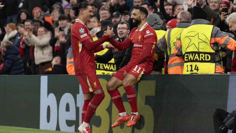 LIVERPOOL, ENGLAND - JANUARY 21: Mohamed Salah of Liverpool celebrates scoring the first goal with team mate Darwin Nunez during the UEFA Champions League 2024/25 League Phase MD7 match between Liverpool FC and LOSC Lille at Anfield on January 21, 2025 in