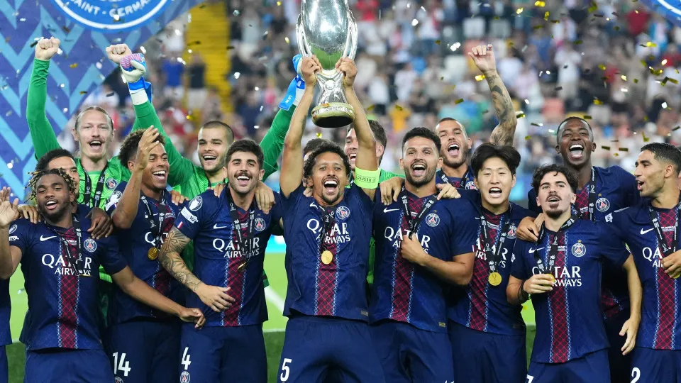 Paris Saint-Germain's Marquinhos celebrates with team-mates as he lifts the UEFA Super Cup trophy after winning the final at the Bluenergy Stadium in Udine, Italy. Picture date: Wednesday August 13, 2025. (Photo by Adam Davy/PA Images via Getty Images)