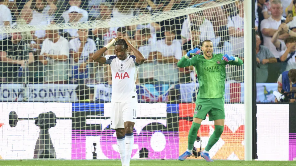 UDINE, ITALY - AUGUST 13: Mathys Tel of Tottenham reacts after missing his penalty kick next to goalkeeper Lucas Chevalier of PSG during the UEFA Super Cup 2025 match between Paris Saint-Germain and Tottenham Hotspur at Friuli Stadium on August 13, 2025 i