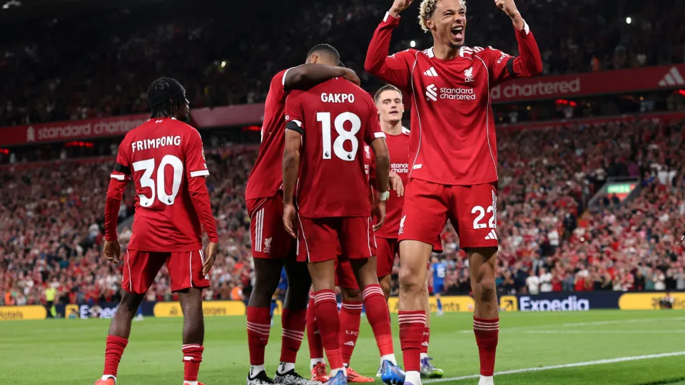 LIVERPOOL, ENGLAND - AUGUST 15: Hugo Ekitike of Liverpool celebrates his team's second goal scored by teammate Cody Gakpo during the Premier League match between Liverpool and Bournemouth at Anfield on August 15, 2025 in Liverpool, England. (Photo by Mich