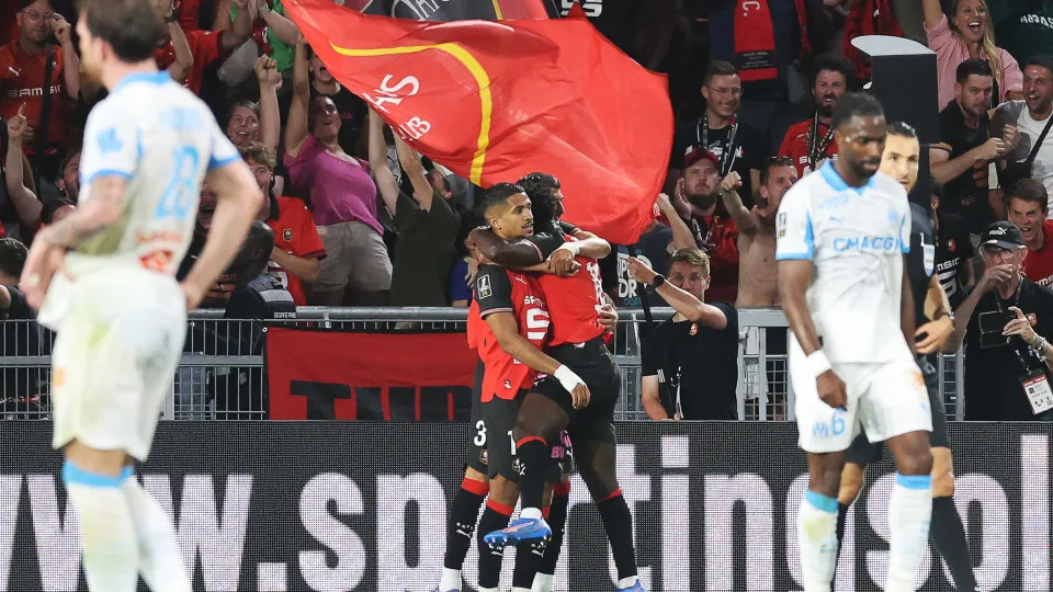 Rennes' French forward #10 Ludovic Blas (centre L) celebrates scoring with teammates his team's first goal during the French L1 football match between Stade Rennais FC and Olympique de Marseille (OM) at Roazhon Park stadium in Rennes, western France, on A