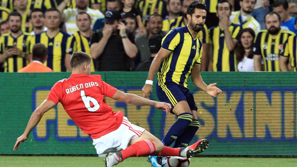 ISTANBUL, TURKEY - AUGUST 14: Alper Potuk of Fenerbahce in action against  Ruben Dias (6) of Benfica during UEFA Champions League third qualifying round's second leg match between Fenerbahce and Benfica at Ulker Stadium in Istanbul, Turkey on August 14, 2