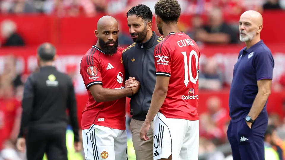 MANCHESTER, ENGLAND - AUGUST 09: Bryan Mbeumo and Matheus Cunha of Manchester United interact with Ruben Amorim, Manager of Manchester United during the pre-season friendly match between Manchester United and ACF Fiorentina at Old Trafford on August 09, 2