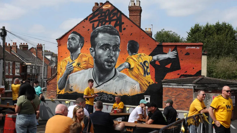 A mural commemorates the late former Wolves and Liverpool player Diogo Jota near Molineux stadium in Wolverhampton, central England on August 16, 2025 ahead of the English Premier League football match between Wolverhampton Wanderers and Manchester City .