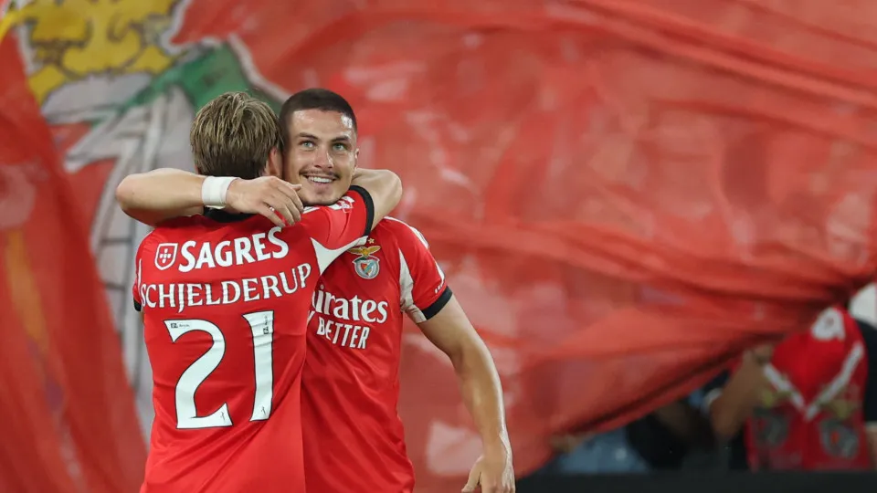 Benfica's Croatian forward #09 Franjo Ivanovic celebrates with his teammate Benfica's Norwegian forward #21 Andreas Schjelderup after scoring his team's first goal during the Portuguese league football match between SL Benfica and CD Tondela at Estadio da