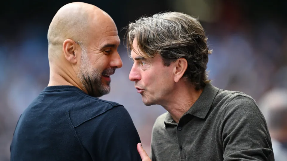 MANCHESTER, ENGLAND - AUGUST 23: Pep Guardiola, Manager of Manchester City interacts with Thomas Frank, Manager of Tottenham Hotspur, during the Premier League match between Manchester City and Tottenham Hotspur at Etihad Stadium on August 23, 2025 in Man