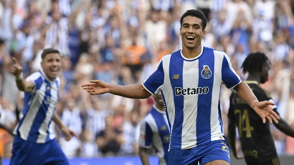 FC Porto's Portuguese defender #20 Alberto Baio celebrates after FC Porto's Argentine defender #18 Nehuen Perez (not seen) scored his team's third goal during the Portuguese league football match between FC Porto and Casa Pia AC at Dragao stadium in Porto